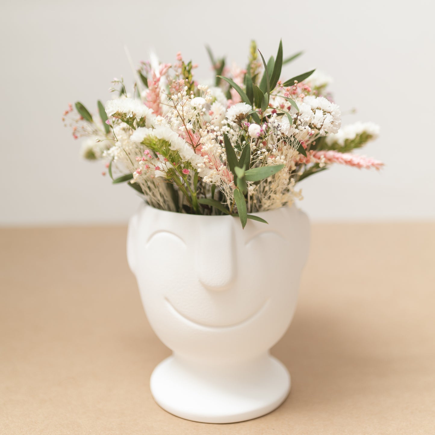 Arrangement of dried and natural flowers