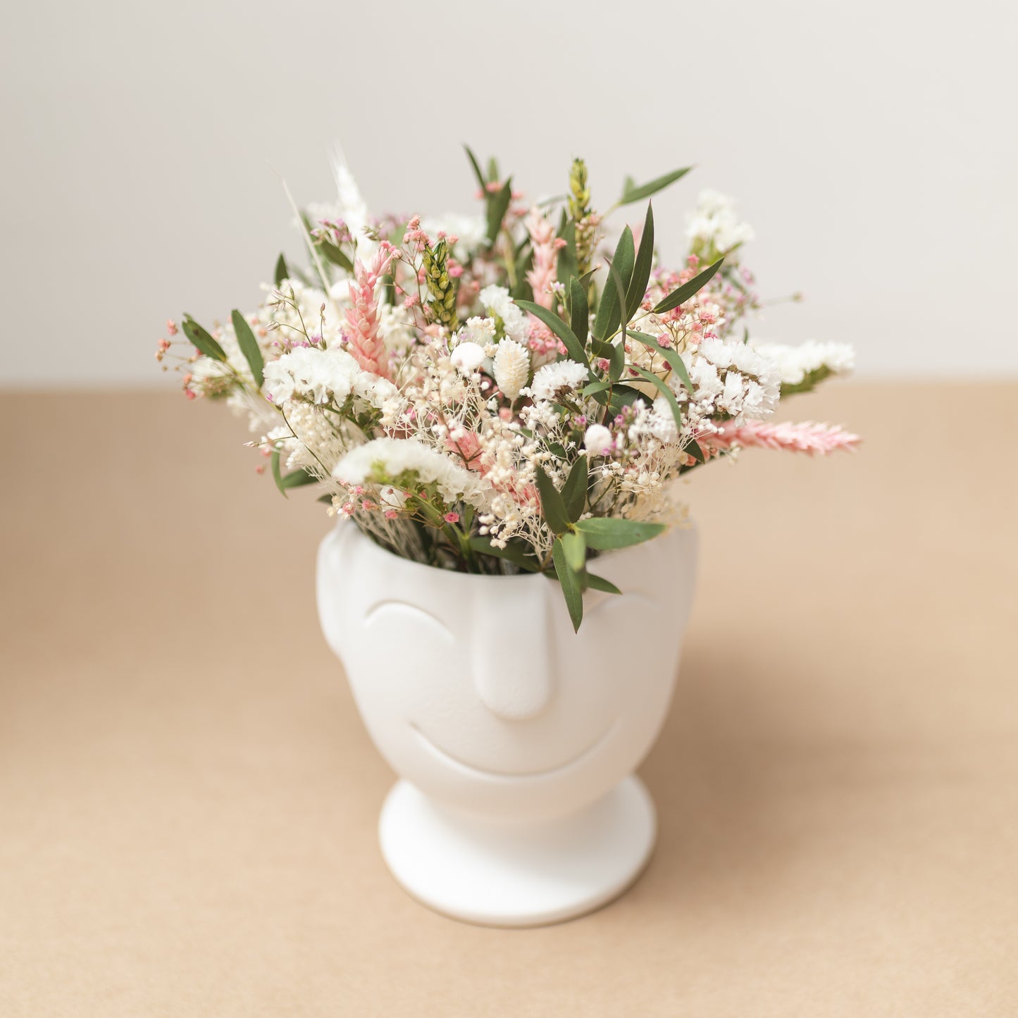 Arrangement of dried and natural flowers