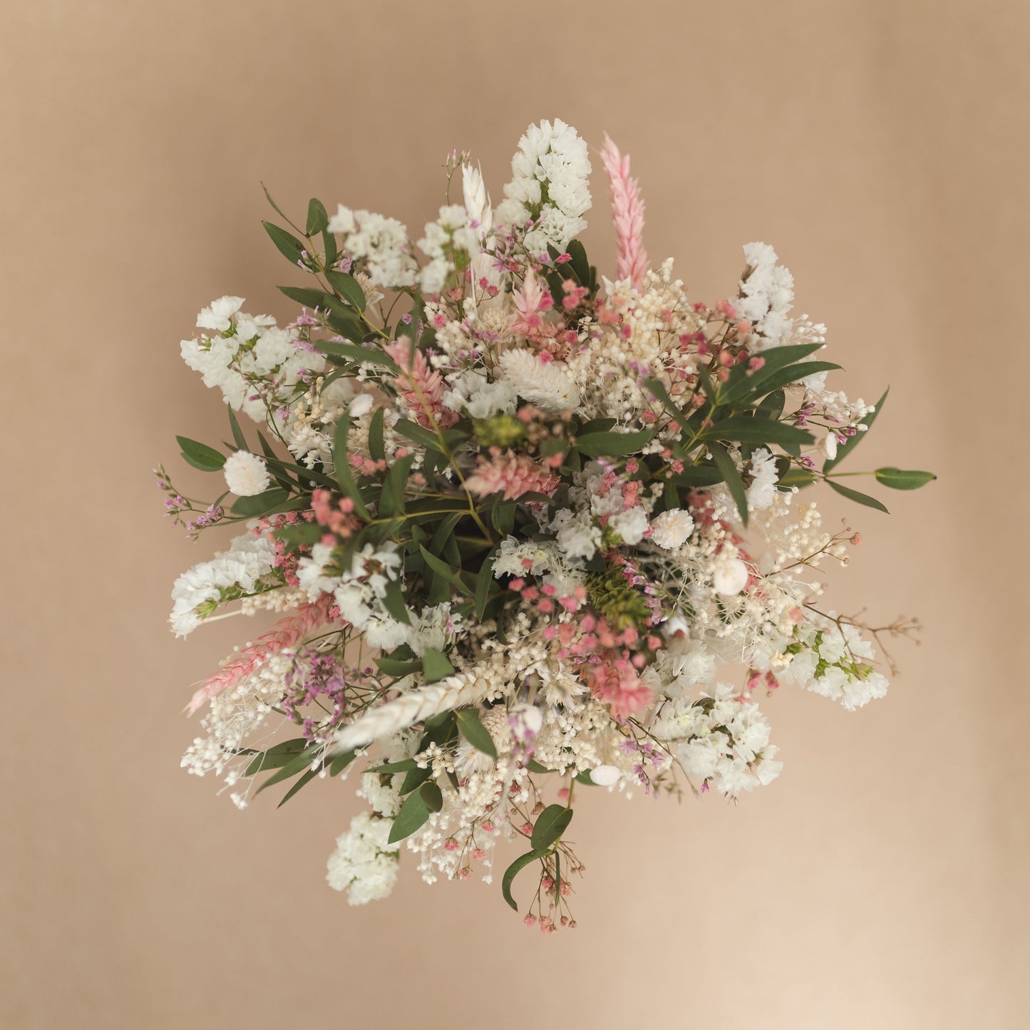 Arrangement of dried and natural flowers
